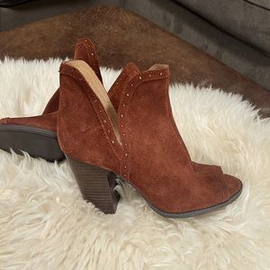 Rust colored Lucky open toe booties.